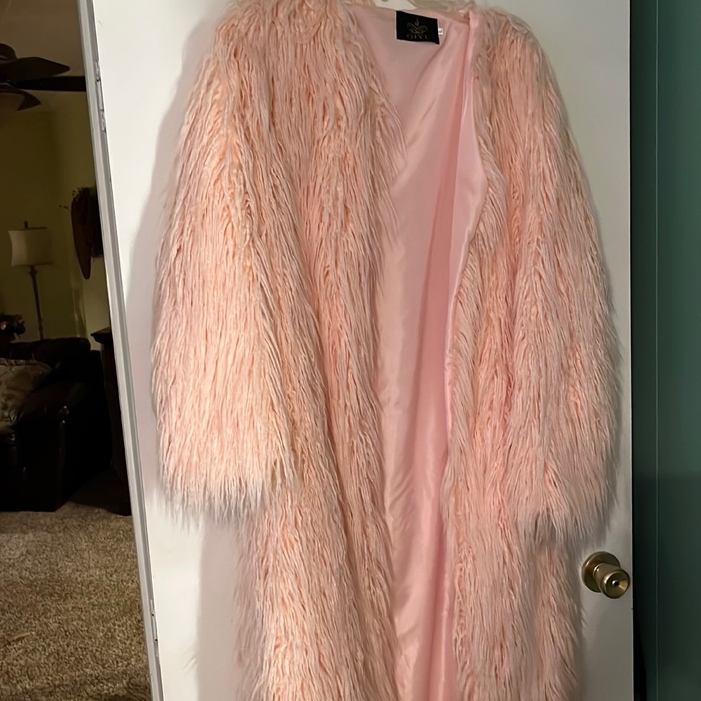 Fuzzy pink coat.